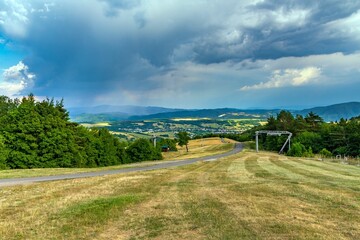 Scenic view of a road surrounded by lush greenery. Selciansky diel, Banska Bystrica, Slovakia.