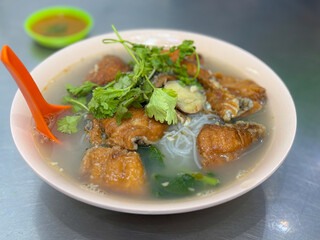 rice noodles fish soup in bowl