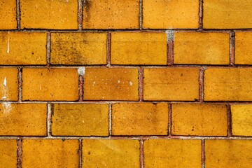Yellow clinker brick wall texture