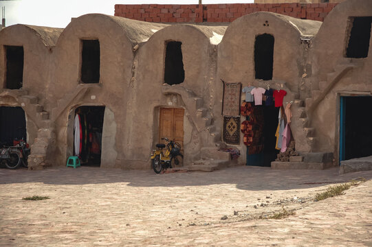 Souvenir stands in Ghorfas of Medenine. old granaries in historic fortified village called Ksar, Medenine city, Tunisia