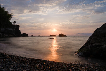 Water waves of the Black Sea crashing on rocks on the stony shore, coast - close up, nobody, no people. Nature, element, landscape