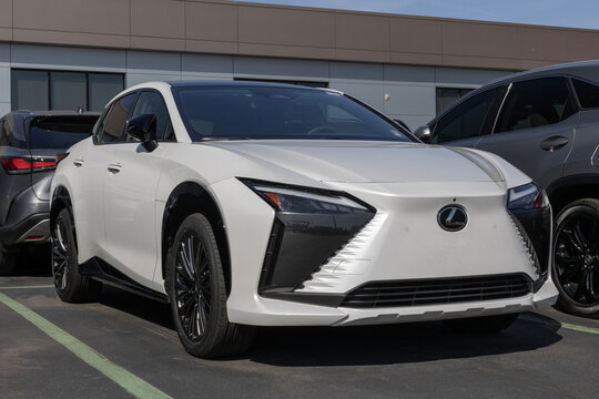 Lexus RZ 450 EV Electric Vehicle display at a dealership. Lexus offers the RZ450 in Premium or Luxury models. MY:2023