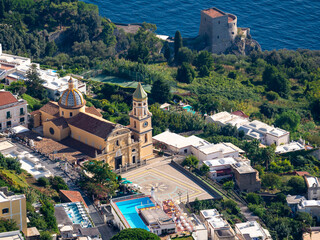 Aerial view of Praiano city and San Gennaro's church with the ancient Saracen tower in the...