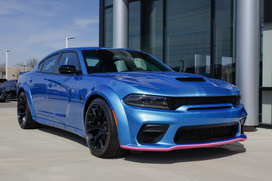Dodge Charger SRT Hellcat Widebody display. Dodge offers the Charger in SXT, GT, R/T, Scat Pack and Hellcat models. MY:2023