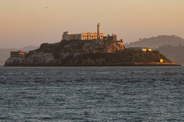 Scenic image of Alcatraz Prison in San Francisco during a beautiful sunrise