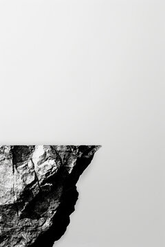 Stones and rocks on a clean background, minimalist layout for a poster, overexposed black and white photography made with Generative AI