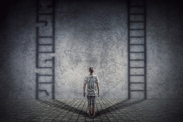 Person stands in front of a wall casting two ladder shadows with one broken on the left and another ready to use on the right. Dilemma and choice concept between good and bad