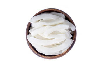 Dried coconut slices on white background