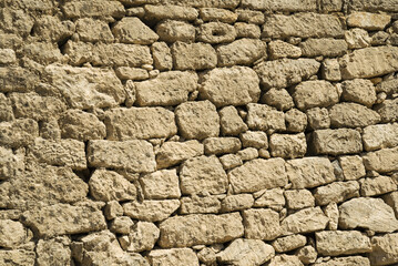 horizontal stone wall in Greece made of large stone