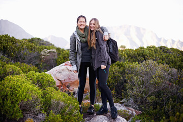 Woman, friends and portrait for mountain trekking or nature adventure for wellness journey, hiking or training. Female people, face and fitness healthy for explore in South Africa, workout or travel