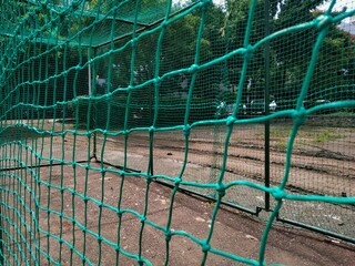 Close up of green net used for cricket practice