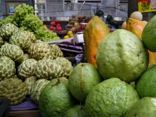 Variety of fresh organic fruits in stall