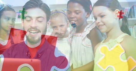 Image of puzzle over diverse schoolchildren