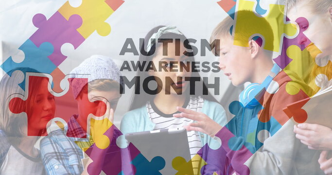 Image of colorful puzzles and autism awareness month over diverse children with tablet - Powered by Adobe