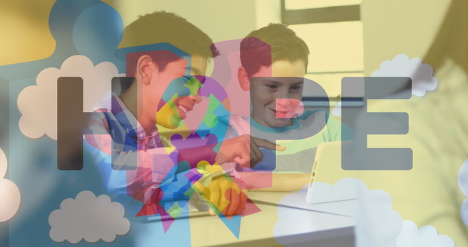 Image of colorful puzzle, clouds and hope over happy caucasian boys using tablet
