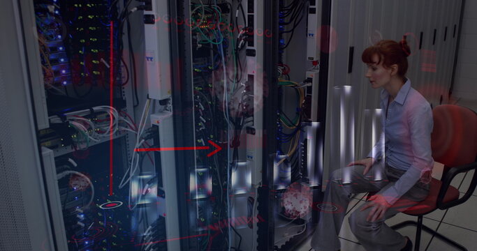 Covid-19 statistical data processing over caucasian female engineers working in computer server room