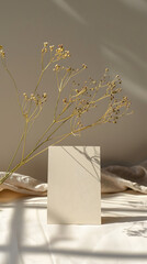 vertical light beige card with rounded corners on table, 
