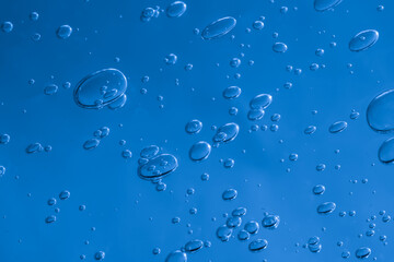 air bubbles in water. dark space background