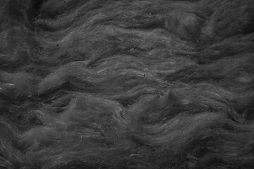 black mineral wool with a visible texture - obrazy, fototapety, plakaty