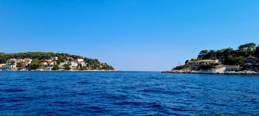 two coasts meeting in the bay of hvar - obrazy, fototapety, plakaty