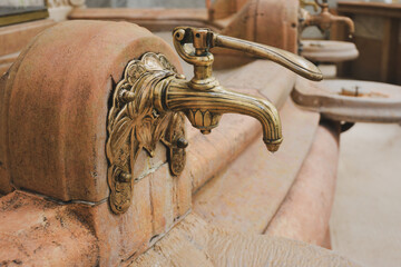 Vintage faucet with a source of mineral water - obrazy, fototapety, plakaty