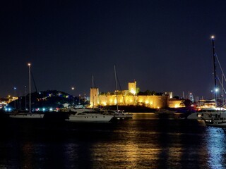 Fototapeta na wymiar Picturesque nighttime view of a European coastal town: Bodrum Castle at night, Turkey