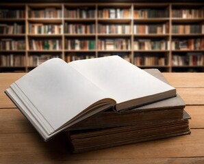 Book stack on the desk in public library