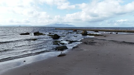 Aerial view of the stunning coastline of Ardrossan, Scotland, featuring crystal blue waters