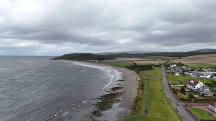 Aerial view of Maidens, Ayrshire, Scotland with a lush green grassy area