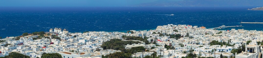 Scenic view of white coastal houses near the sea in Mykonos, Greece, Mediterranean
