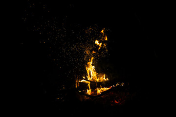Bonfire flames on a black background. The concept of memory, mysticism.
