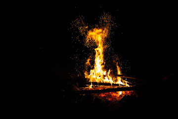 Bonfire flames on a black background. The concept of memory, mysticism.