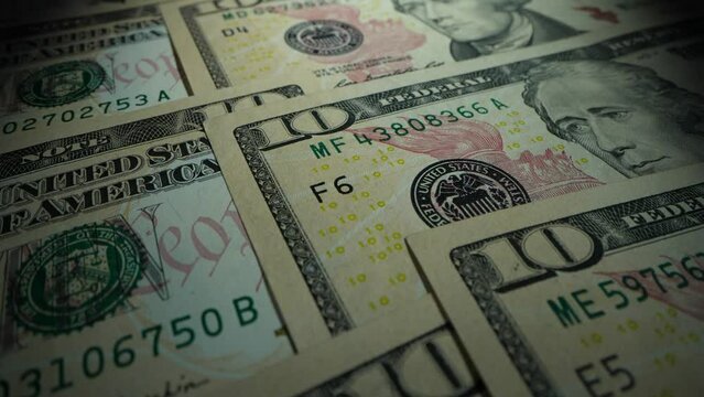 US dollar bills rotation, usd banknotes. 4K UHD video clip