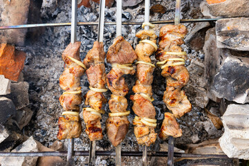 Shish kebab on the improvised oven made of brick