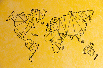 Real detailed world map of continents. Isolated on a yellow background. The real flavor of the continents. Tutorial.