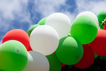 Multicolored balloons at the city festival. Holiday concept.