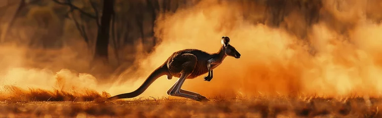 Fotobehang A kangaroo bounding energetically through a vast field of lush green grass © sommersby