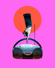 Hand turning on retro music player, radio against pink background. Grainy effect. Contemporary art...