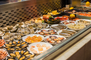 a table full of plates of oysters and oysters