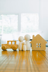 Family, house and car model, Security protection and health insurance. The concept of family home,...