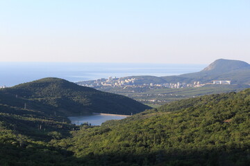 Fototapeta na wymiar Crimean mountains and sea on a sunny summer day