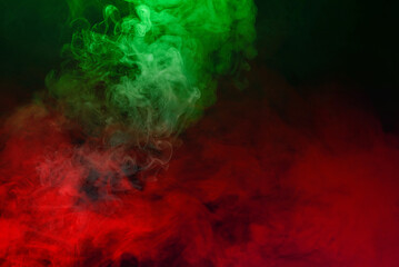 Green and pink steam on a black background.