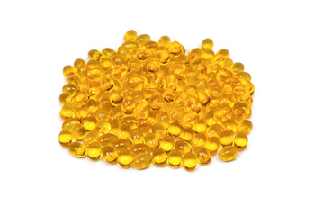 A group of yellow capsules isolated on a white background.