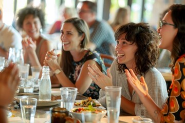 A group of women are seated at a table with plates of food, engaged in conversation during a dining scene - obrazy, fototapety, plakaty