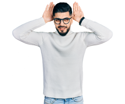 Young arab man with beard wearing elegant turtleneck sweater and glasses doing bunny ears gesture with hands palms looking cynical and skeptical. easter rabbit concept.