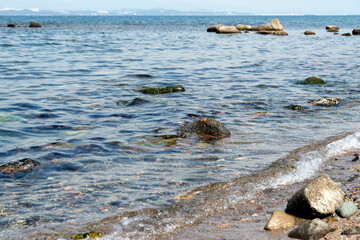 View of the surf on the stone at the seaside