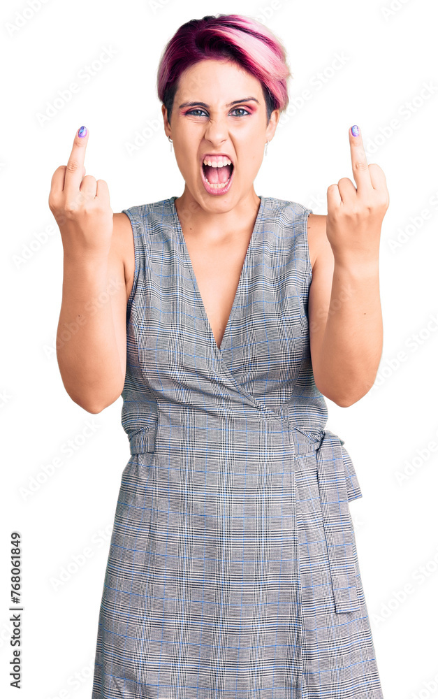 Sticker young beautiful woman with pink hair wearing casual clothes showing middle finger doing fuck you bad