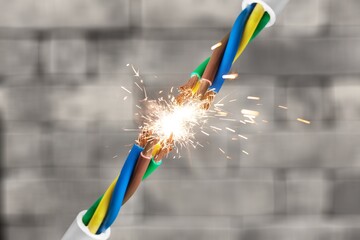 Sparks explosion at electrical cables hazard concept