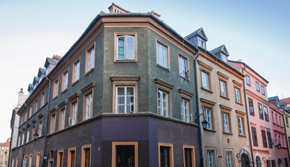 Fototapeta na wymiar Tenement houses at Krzywe Kolo Street, Warsaw Old Town, Poland