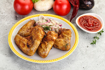 Grilled chicken wings with sauce